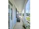 Inviting front porch features a bench and natural light streaming through the glass door at 1002 Dogwood Bloom Ln, Knightdale, NC 27545
