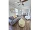 Comfortable living room with hardwood floors, a neutral color palette, and plenty of natural light at 1002 Dogwood Bloom Ln, Knightdale, NC 27545