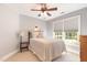 Cozy bedroom with ample natural light and a comfortable bed at 1003 Fairfax Woods Dr, Apex, NC 27502