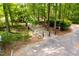 Sidewalk through neighborhood of mature trees at 1003 Fairfax Woods Dr, Apex, NC 27502
