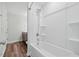 Bright bathroom featuring soaking tub and shower combination at 1005 Whispering Creek Ct, Knightdale, NC 27545