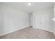 Neutral bedroom featuring plush carpet, fresh paint, and large closet at 1005 Whispering Creek Ct, Knightdale, NC 27545