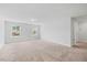 Spacious bedroom with two windows bringing in ample natural light at 1005 Whispering Creek Ct, Knightdale, NC 27545