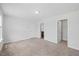 Spacious bedroom with two doorways leading to a bathroom and a closet at 1005 Whispering Creek Ct, Knightdale, NC 27545