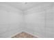 Walk-in closet with wire shelving providing extensive storage solutions and carpet flooring at 1005 Whispering Creek Ct, Knightdale, NC 27545