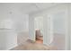 Bright hallway with views into the bedroom and bathroom, showcasing the home's open layout at 1005 Whispering Creek Ct, Knightdale, NC 27545