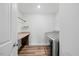 Laundry room featuring granite countertops, washer, dryer and hardwood floors at 1005 Whispering Creek Ct, Knightdale, NC 27545