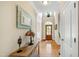 Spacious hallway leading to the front door with stylish decor at 10113 San Remo Pl, Wake Forest, NC 27587