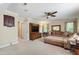 Comfortable living room with plush seating, TV, and ample natural light at 10113 San Remo Pl, Wake Forest, NC 27587