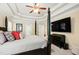 Spacious main bedroom features tray ceilings, neutral decor and a sitting area at 10113 San Remo Pl, Wake Forest, NC 27587