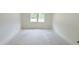 A bedroom under construction featuring two windows providing natural light to the space at 102 Gobbler Dr, Smithfield, NC 27577
