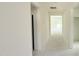 Spacious hallway leading to an unfinished living area, showcasing modern construction at 102 Gobbler Dr, Smithfield, NC 27577