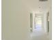 Bright hallway under construction with natural light flowing through the entry door at 102 Gobbler Dr, Smithfield, NC 27577