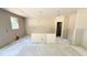 Spacious kitchen with window offering natural light in an unfinished space at 102 Gobbler Dr, Smithfield, NC 27577