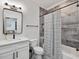 Modern bathroom featuring a shower-tub combo and large sink at 1027 S Duke St, Durham, NC 27707
