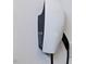 Tesla electric vehicle charging station on the wall at 1027 S Duke St, Durham, NC 27707