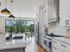 Bright kitchen features a center island, stainless appliances, and ample counter space at 1027 S Duke St, Durham, NC 27707