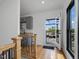 Hallway featuring modern kitchen and access to rooftop deck at 1027 S Duke St, Durham, NC 27707
