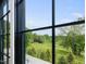 Scenic view from the window overlooking lush greenery at 1027 S Duke St, Durham, NC 27707