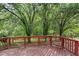 Enjoy backyard views from this spacious stained deck and overlook the green space of the backyard at 103 Trent Woods Way, Cary, NC 27519