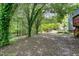 Spacious backyard featuring trees providing shade at 103 Trent Woods Way, Cary, NC 27519
