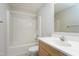 Neutral bathroom featuring a tub and shower combination and vanity with sink at 103 Trent Woods Way, Cary, NC 27519