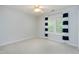 This bedroom is bathed in natural light and has neutral carpet and ceiling fan at 103 Trent Woods Way, Cary, NC 27519
