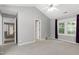 Spacious bedroom with neutral carpet and lots of natural light from the window at 103 Trent Woods Way, Cary, NC 27519