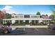 Community clubhouse with modern architecture, manicured landscaping, and convenient parking at 103 Vulcan St, Garner, NC 27529