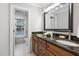Bathroom featuring double sinks with granite counters, and plenty of natural light at 105 Bergeron Way, Cary, NC 27519