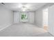 Bedroom with large window, window seat and two closets at 105 Bergeron Way, Cary, NC 27519