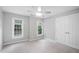 Comfortable bedroom featuring natural light, neutral walls, and a ceiling fan at 105 Bergeron Way, Cary, NC 27519