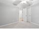 Neutral bedroom with plush carpeting and ample closet space, perfect for storage at 105 Bergeron Way, Cary, NC 27519
