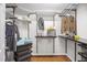 Walk-in closet with custom shelving and hardwood floors for optimal organization and storage at 105 Bergeron Way, Cary, NC 27519