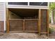 Under-deck access and storage area with gated entry offering functional use of space at 105 Bergeron Way, Cary, NC 27519