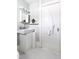 Small bathroom with a uniquely designed sink and modern lighting at 107 E Hammond St, Durham, NC 27704
