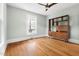 Bedroom with hardwood floors and a large window providing natural light at 107 E Hammond St, Durham, NC 27704