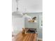 Bright kitchen features butcher block countertops, stainless steel stove, and pendant lights at 107 E Hammond St, Durham, NC 27704