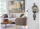 Peeking into a living room through a door with a vintage glass handle at 107 E Hammond St, Durham, NC 27704
