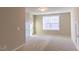 Inviting bonus room featuring plush carpeting, a bright window, and neutral walls creating a versatile space at 1091 Fairhaven Dr # 47, Mebane, NC 27302