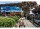Local mural enhances community charm, set amidst colorful landscaping and benches at 1091 Fairhaven Dr # 47, Mebane, NC 27302