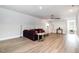Spacious bonus room with neutral paint, contemporary ceiling fan, and modern decor at 1112 Valley Rose Way, Durham, NC 27712