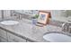 Bathroom featuring double sinks with granite countertops, offering both style and functionality for daily routines at 115 Standish Dr, Chapel Hill, NC 27517