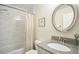 Updated bathroom features granite countertop, modern fixtures, and shower/tub combo for a relaxing experience at 115 Standish Dr, Chapel Hill, NC 27517