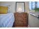 Charming bedroom displaying a bedside table with a modern lamp, enhancing the room's cozy and stylish appeal at 115 Standish Dr, Chapel Hill, NC 27517