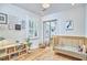 Bright and cheerful Bedroom with hardwood floors and ample space for play at 115 Standish Dr, Chapel Hill, NC 27517