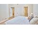 Bright bedroom with multiple doorways including the ensuite bathroom at 115 Standish Dr, Chapel Hill, NC 27517