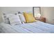 Comfortable bedroom featuring a cozy bed with decorative pillows, creating an inviting and restful space at 115 Standish Dr, Chapel Hill, NC 27517