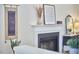 Elegant fireplace featuring a decorative mantle, tasteful artwork, and sophisticated accessories, enhancing the room's ambiance at 115 Standish Dr, Chapel Hill, NC 27517