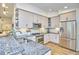 Well-appointed kitchen featuring stainless steel appliances and sleek countertops at 115 Standish Dr, Chapel Hill, NC 27517